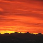 Sonnenuntergang mit Alpenpanorama