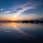 Sonnenuntergang mit Blick auf den Leuchtturm in Podersdorf