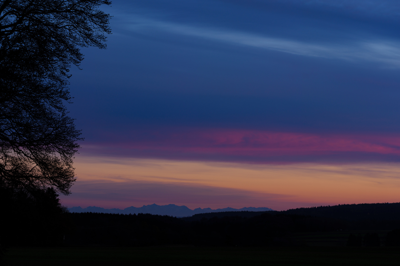 Sonnenuntergang mit Blick auf die Alpen