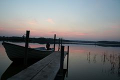 Sonnenuntergang mit Boot