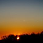Sonnenuntergang mit Flugzeuge am Horizont