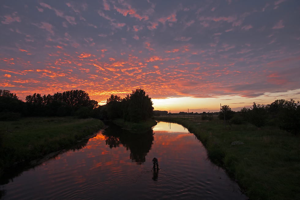 Sonnenuntergang mit Fotograf...