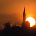 Sonnenuntergang mit Kirche von Tamins