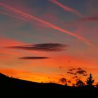 Sonnenuntergang mit Kondensstreifen