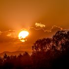 Sonnenuntergang mit leuchtende Wolken