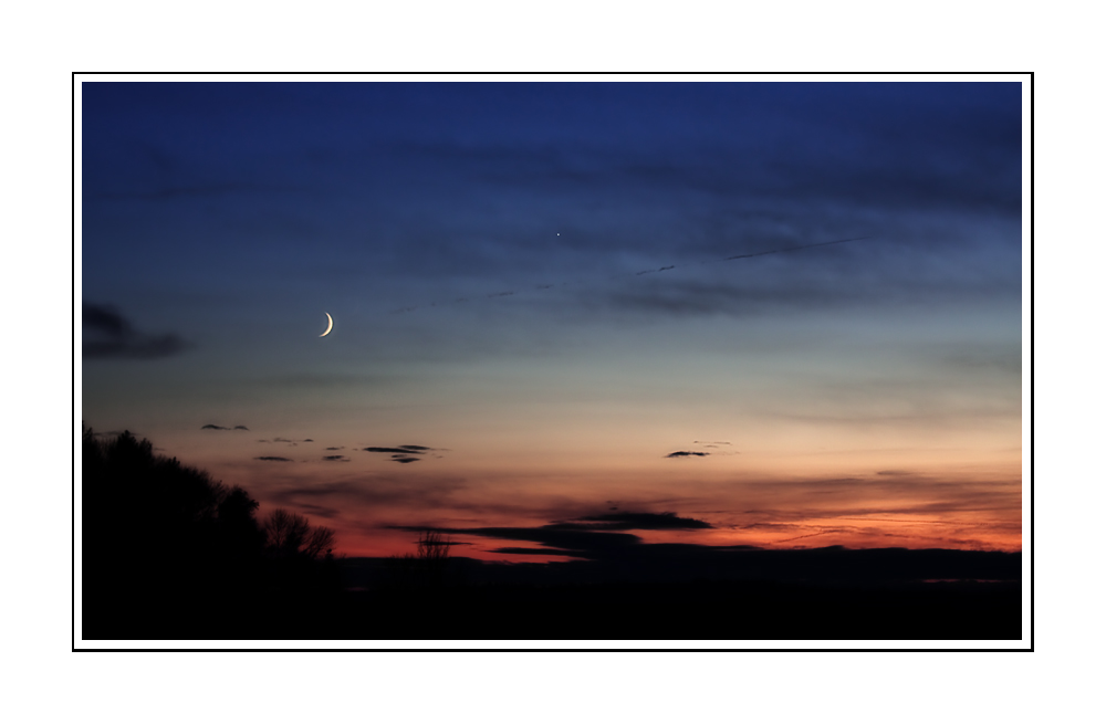 Sonnenuntergang mit Mond