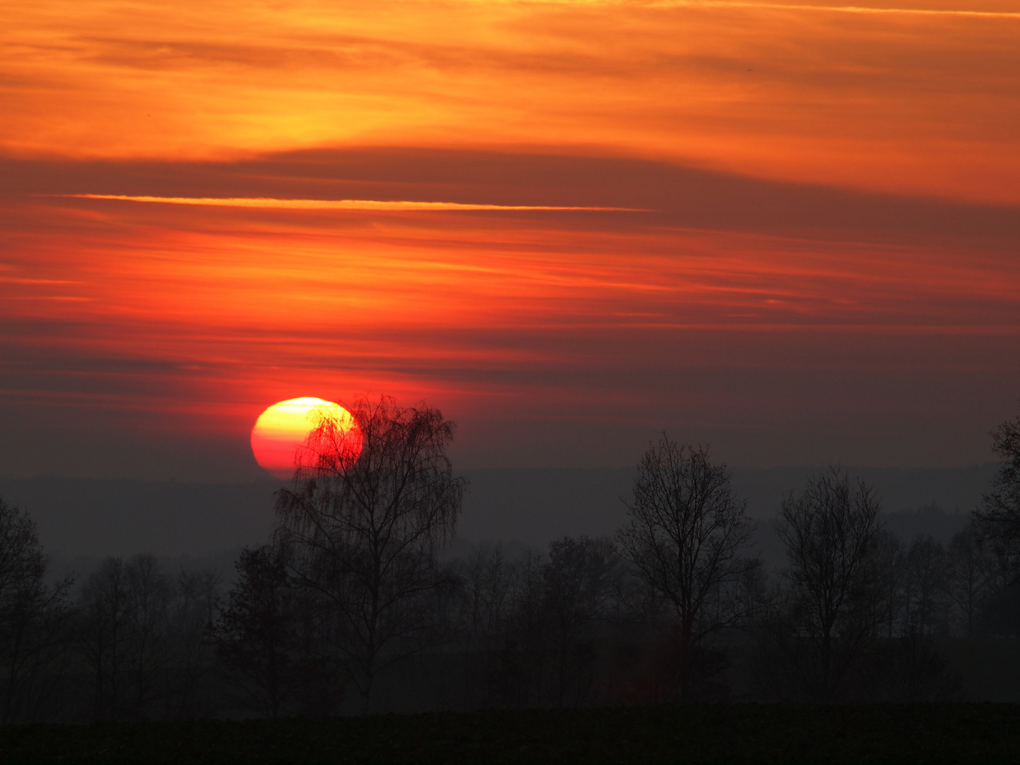 Sonnenuntergang mit reflexion am Horizont in Bad Kissingen