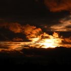 Sonnenuntergang mit Regenwolken