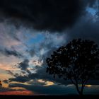 Sonnenuntergang mit Regenwolken