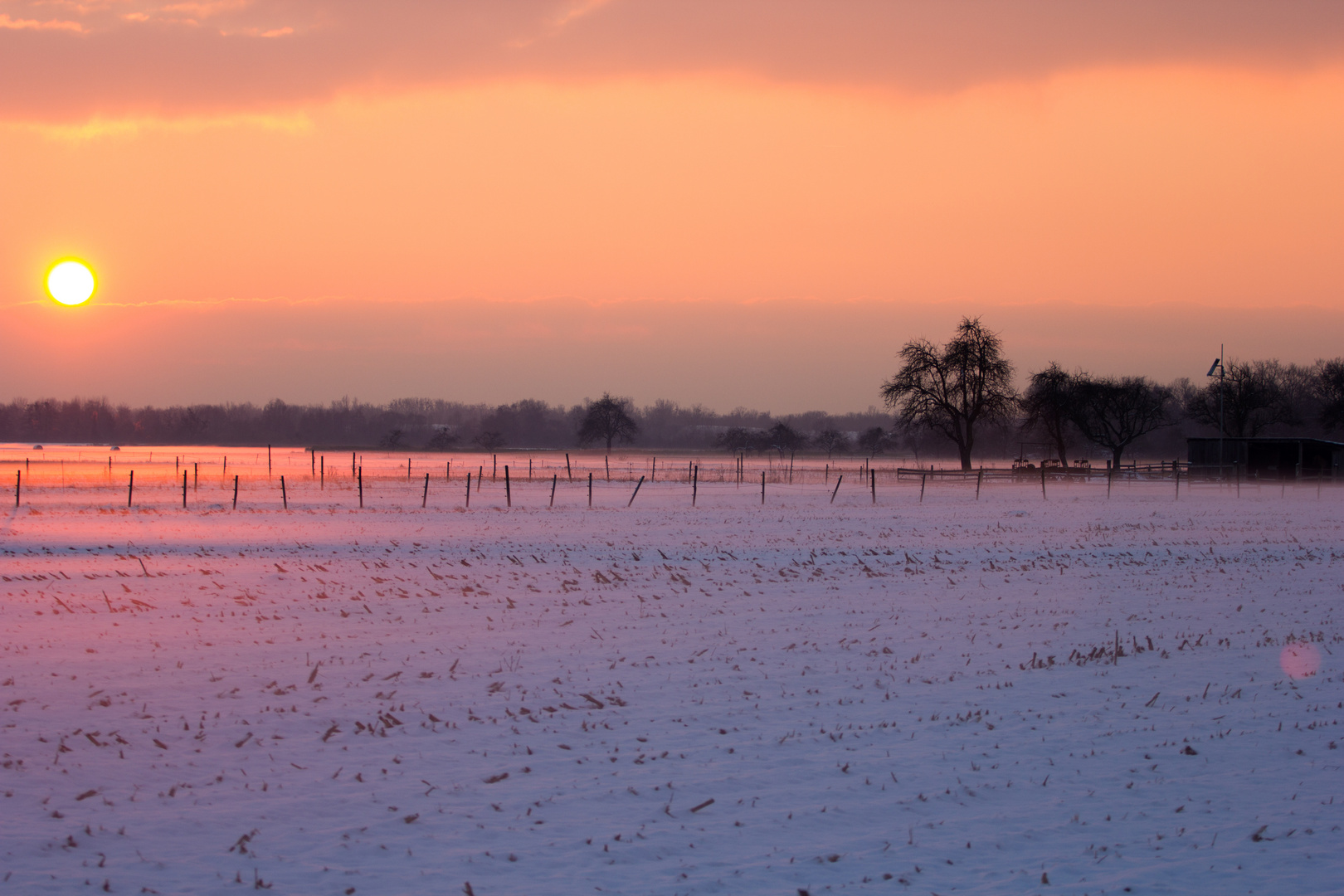 Sonnenuntergang mit Schnee