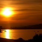 Sonnenuntergang- mit Ufer