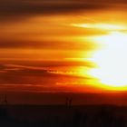 Sonnenuntergang mit Windrädern