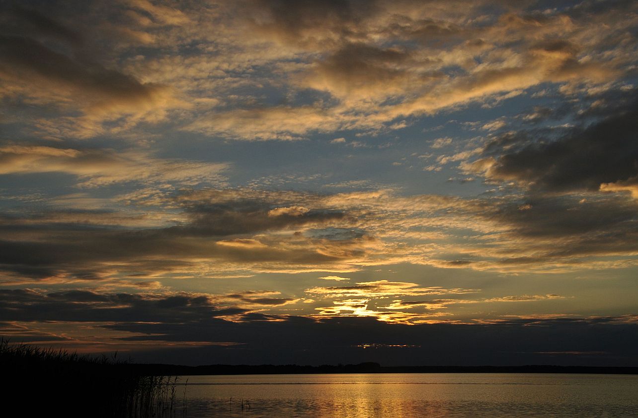 Sonnenuntergang mit Wolkengemälde