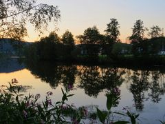 Sonnenuntergang-Stimmung am Regen