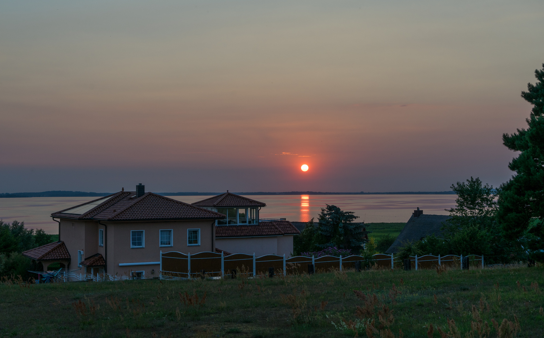  Sonnenuntergang über dem Achterwasser in Loddin/ Usedom 