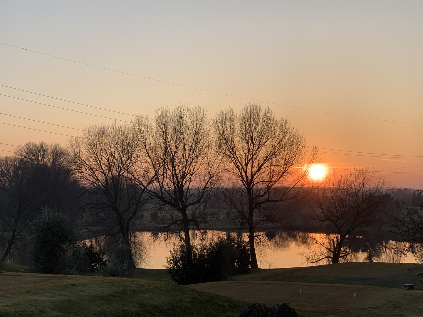 Sonnenuntergang über dem Golfplatz