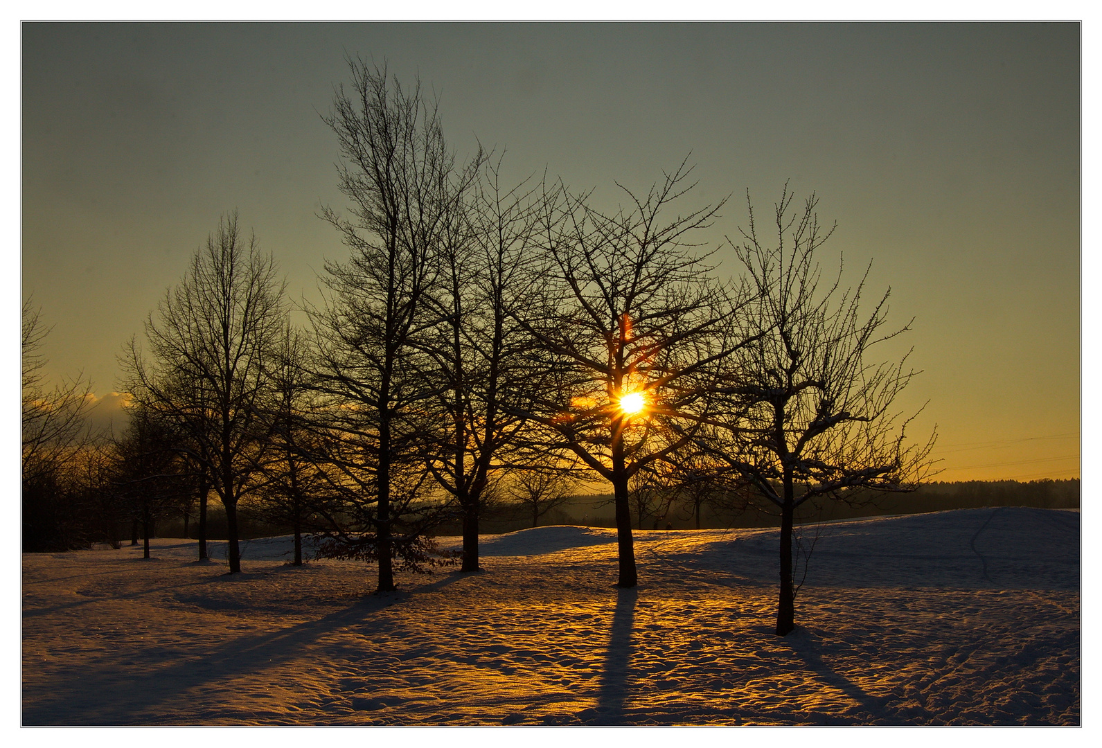 Sonnenuntergang über dem Golfplatz