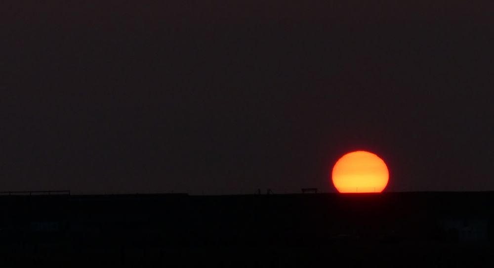 Sonnenuntergang über dem Nordseedeich..