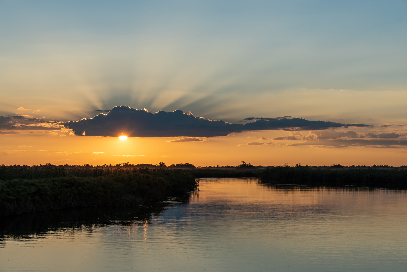 Sonnenuntergang über dem Okawango - II