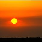 Sonnenuntergang über dem Suezkanal nach einem Sandsturm