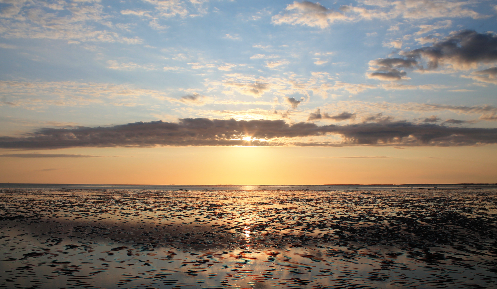 Sonnenuntergang über dem Watt