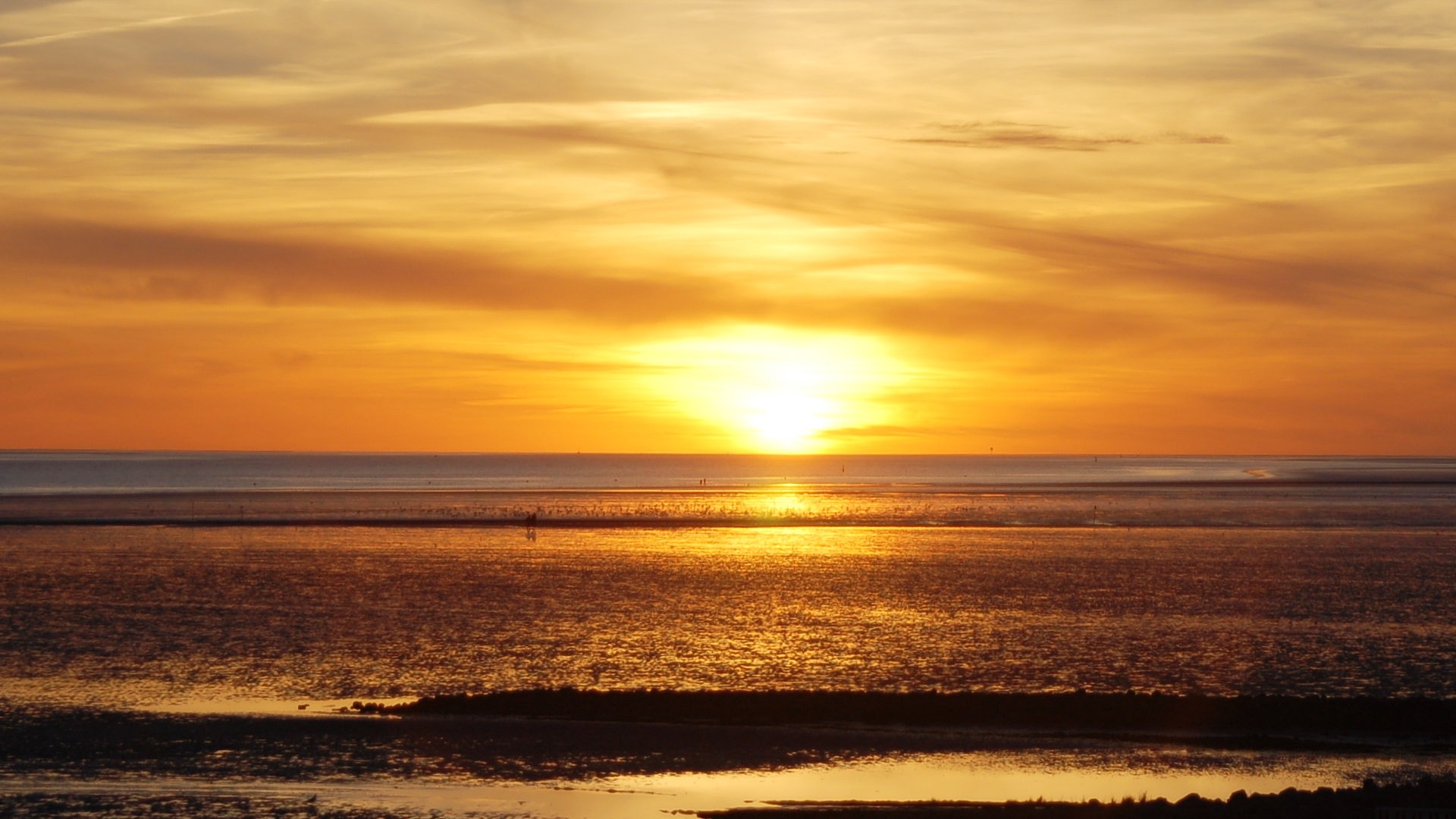 Sonnenuntergang über dem Watt vor Büsum