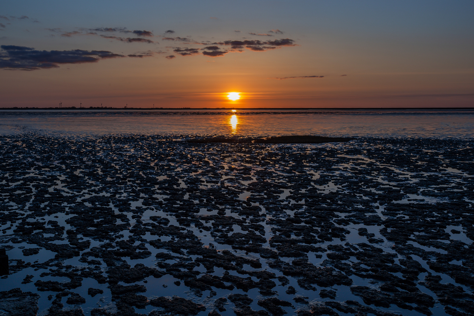 Sonnenuntergang über dem Wattenmeer