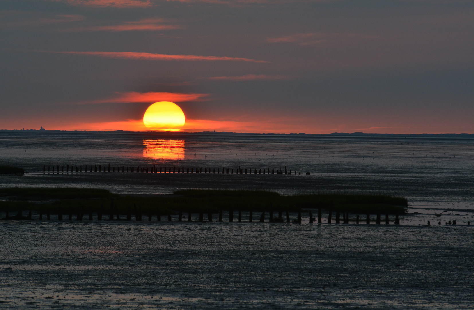 Sonnenuntergang über dem Wattenmeer