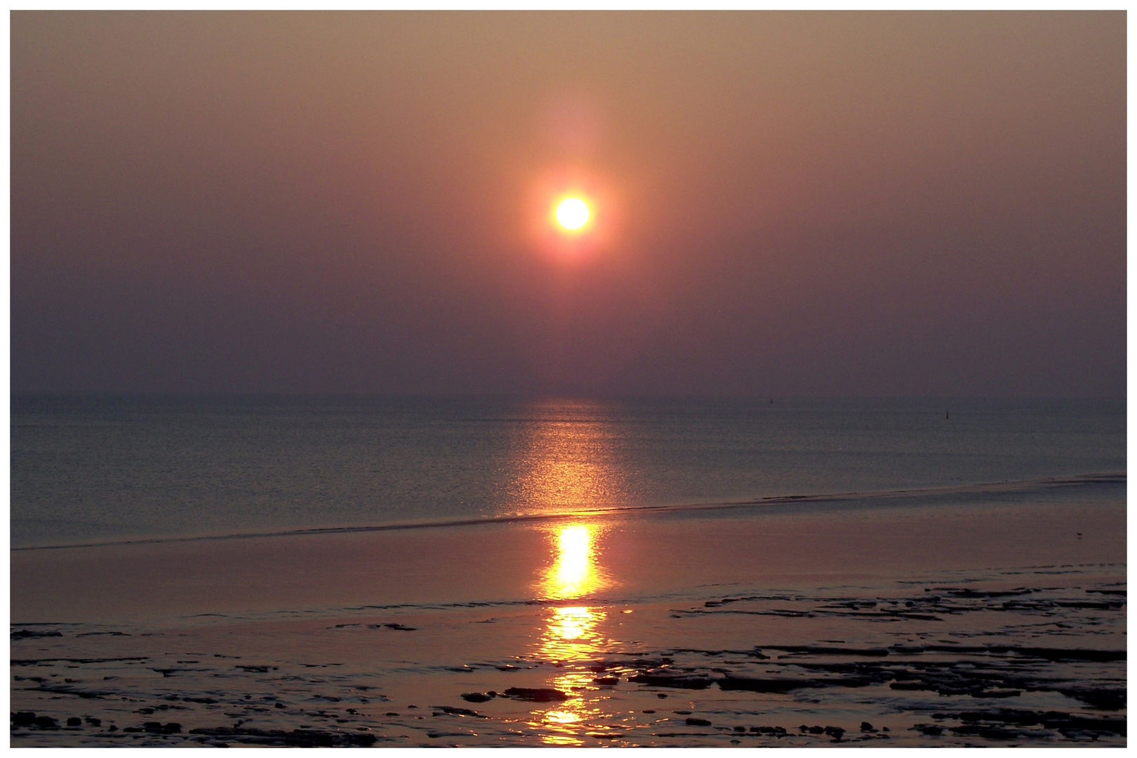 Sonnenuntergang über dem Wattenmeer