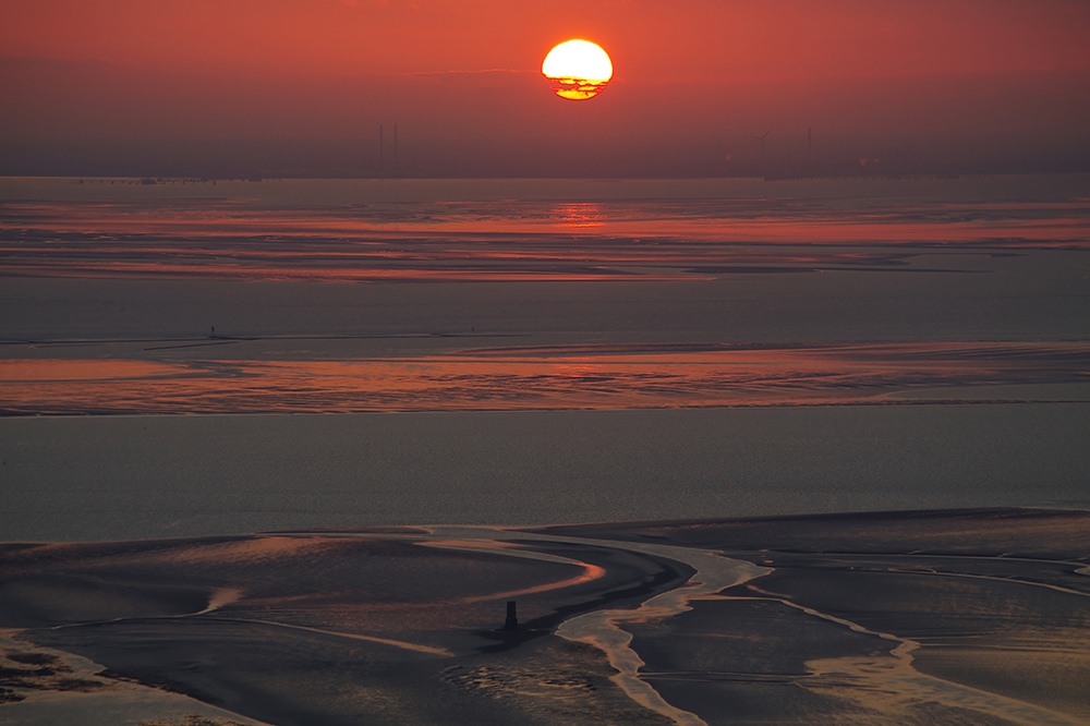 Sonnenuntergang über dem Wattenmeer