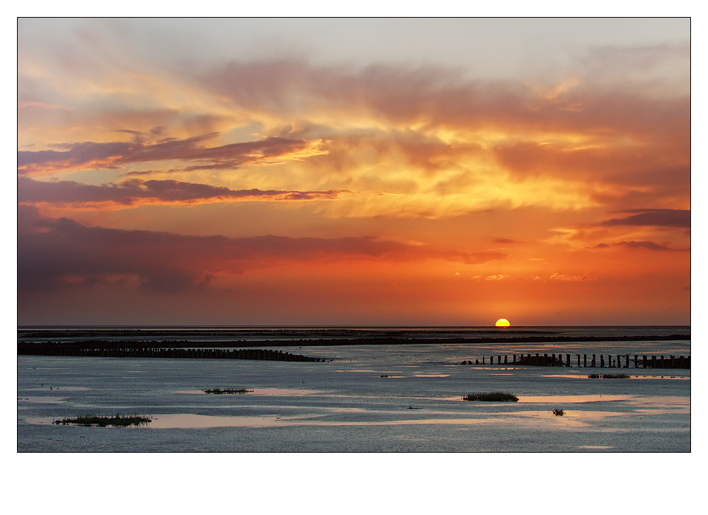 Sonnenuntergang über dem Wattenmeer