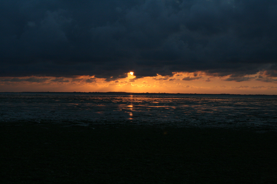 Sonnenuntergang über dem Wattenmeer