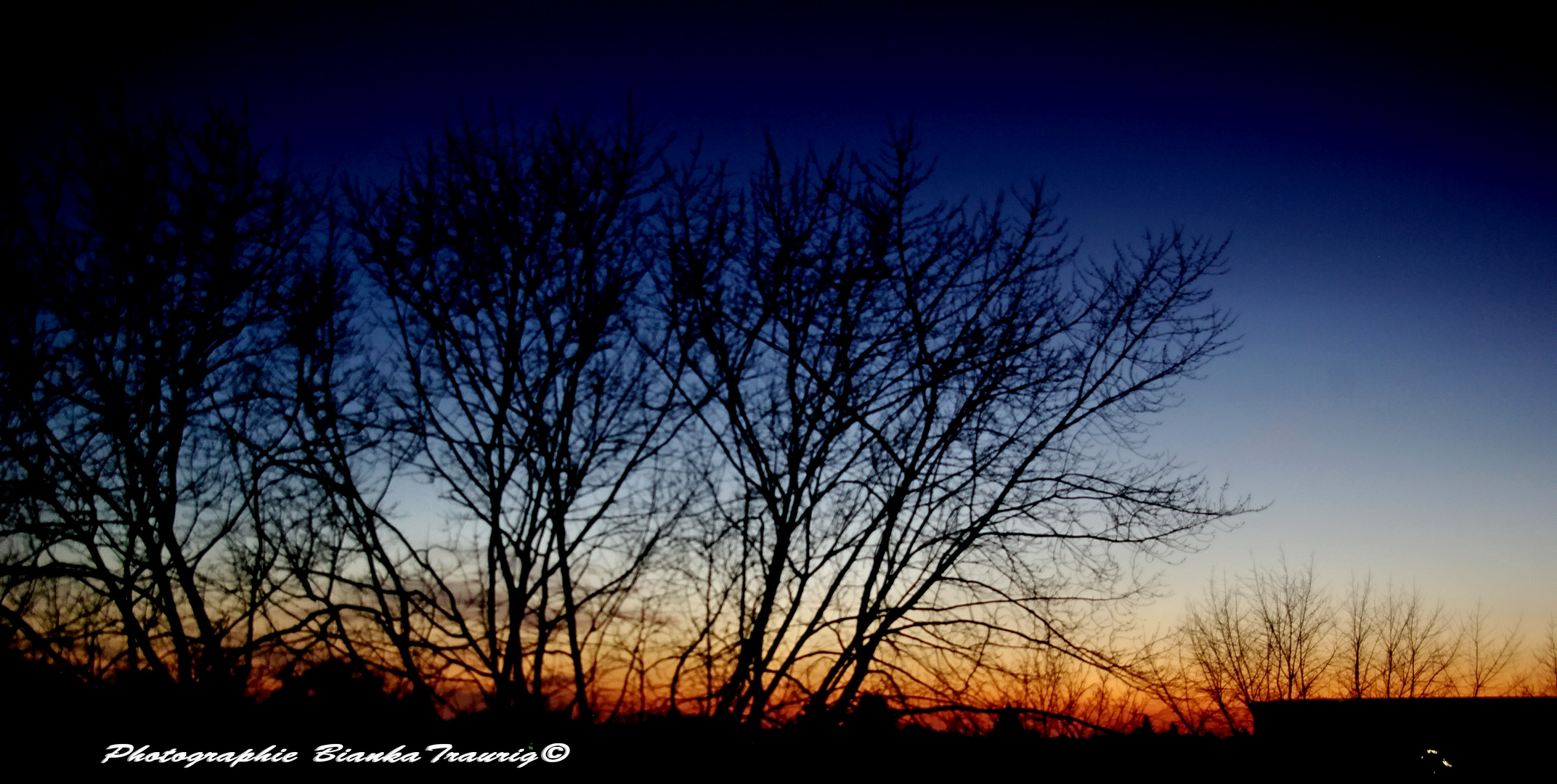 Sonnenuntergang über den Dächern von Moers