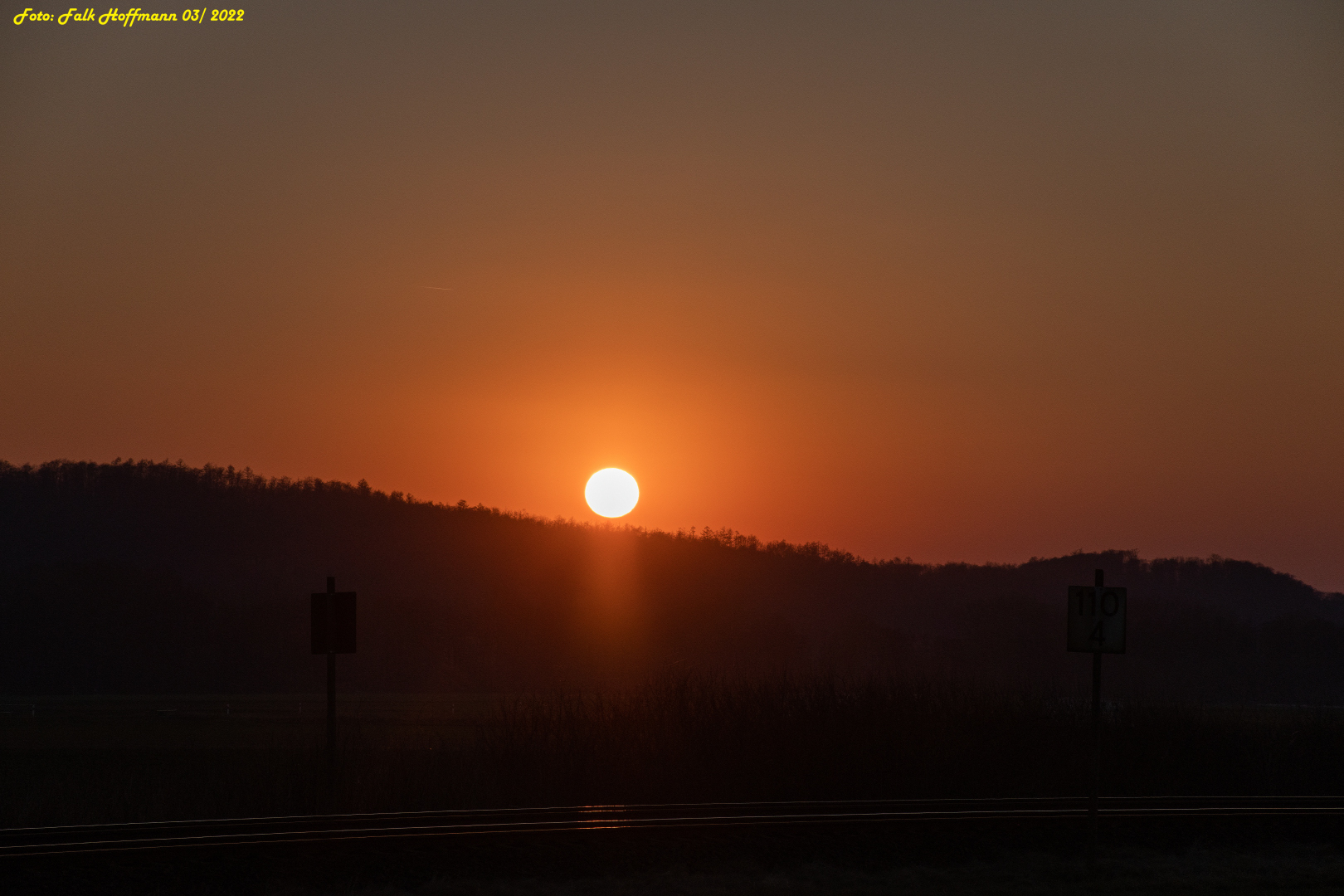 Sonnenuntergang über den Gleisen