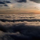 Sonnenuntergang über den Wolken