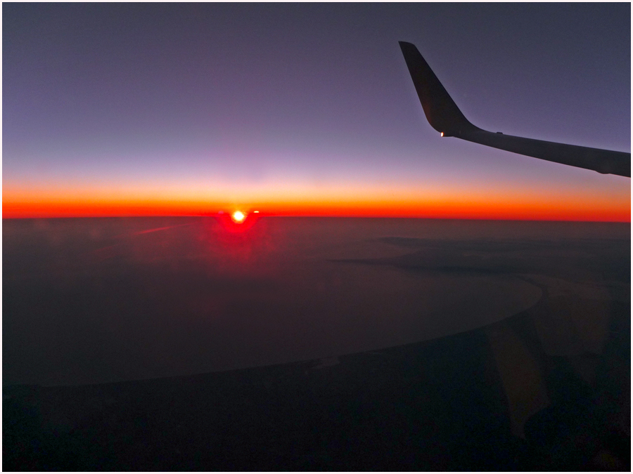 Sonnenuntergang über den Wolken