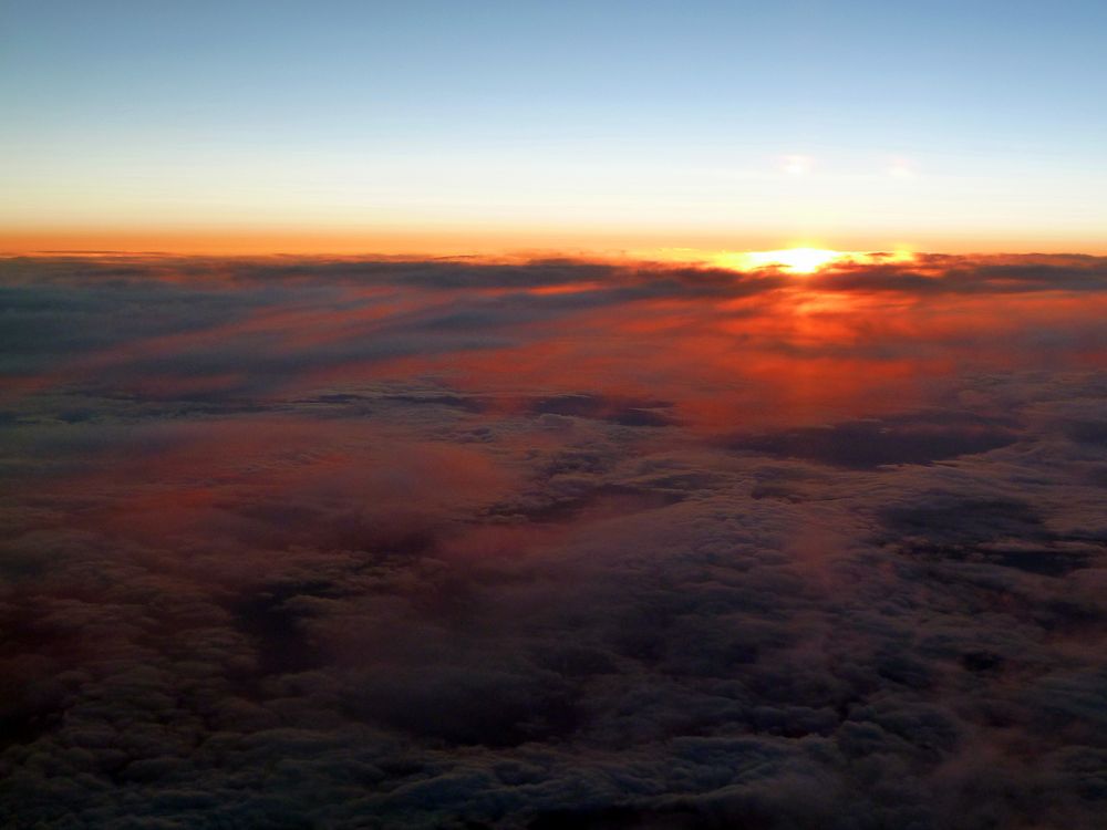 Sonnenuntergang über den Wolken