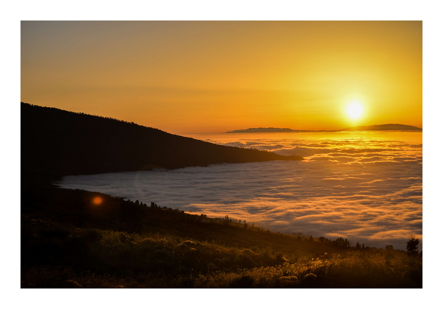 Sonnenuntergang über den Wolken