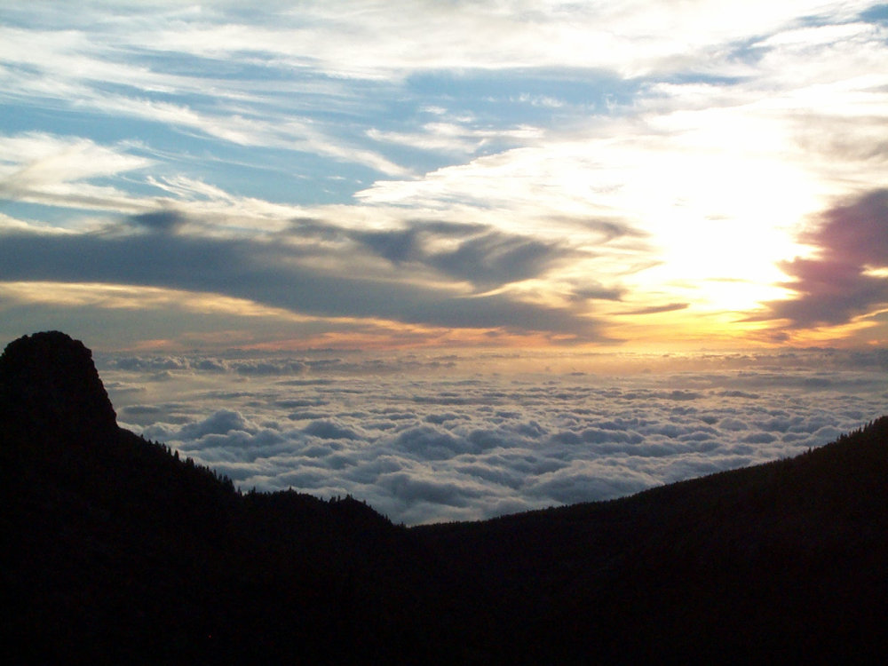 Sonnenuntergang über den Wolken