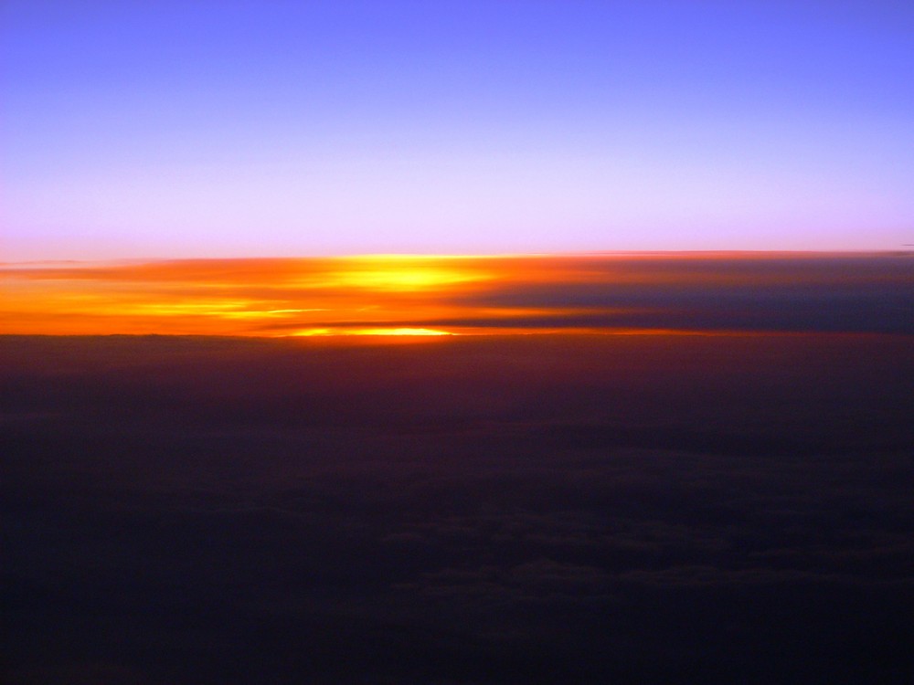 sonnenuntergang über den wolken