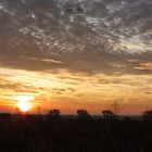 Sonnenuntergang über einen Feld