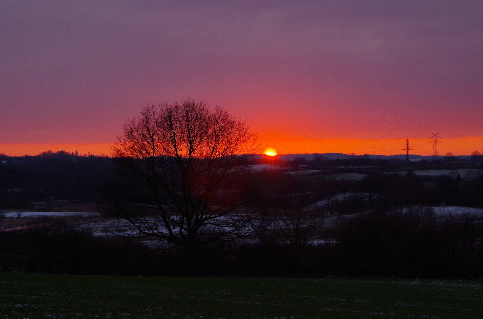 Sonnenuntergang über Molfsee