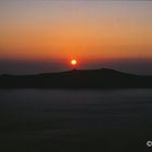 Sonnenuntergang über Nea Kameni (Santorini)