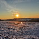 Sonnenuntergang über Schnee 