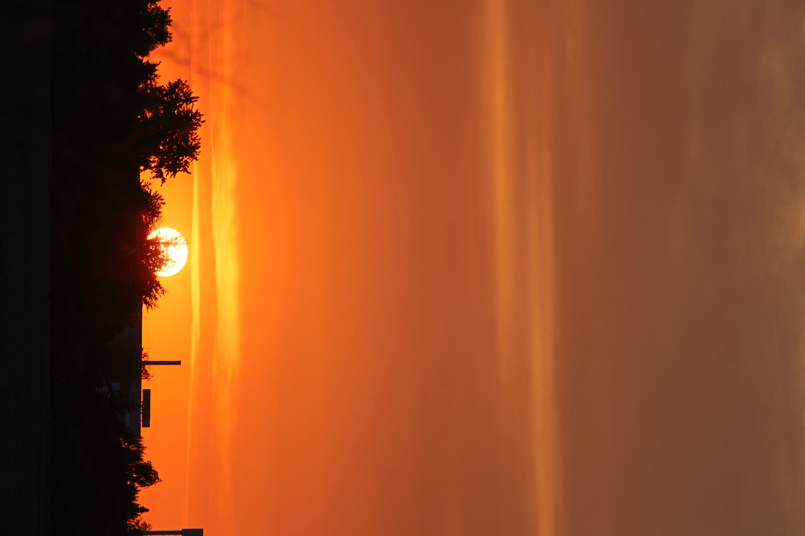 Sonnenuntergang überm Feld