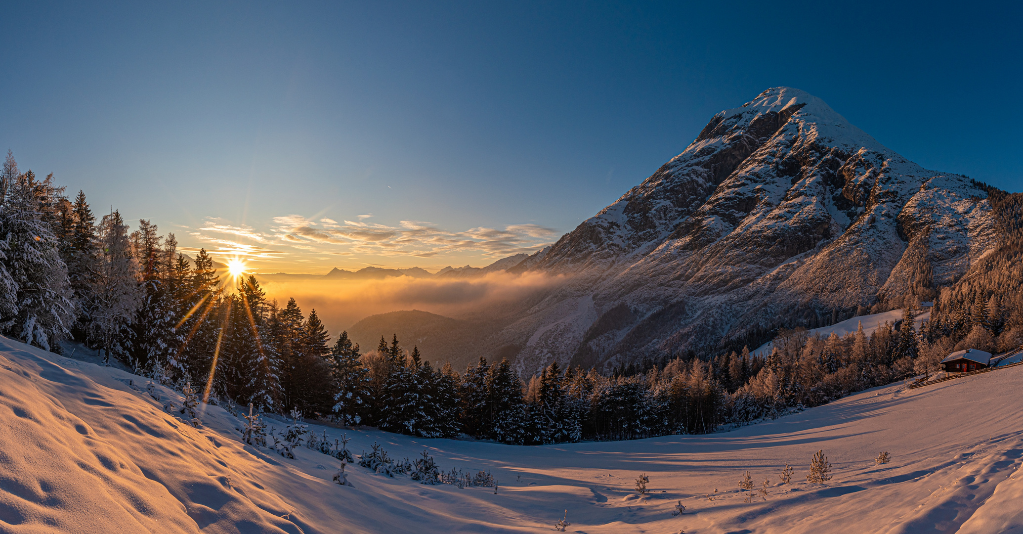 Sonnenuntergang überm Nebel