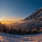 Sonnenuntergang überm Nebel