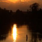 Sonnenuntergang und Angler