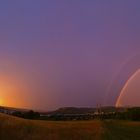 Sonnenuntergang und Regenbogen