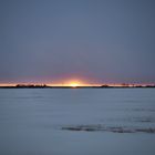 Sonnenuntergang von unter der Wolkendecke